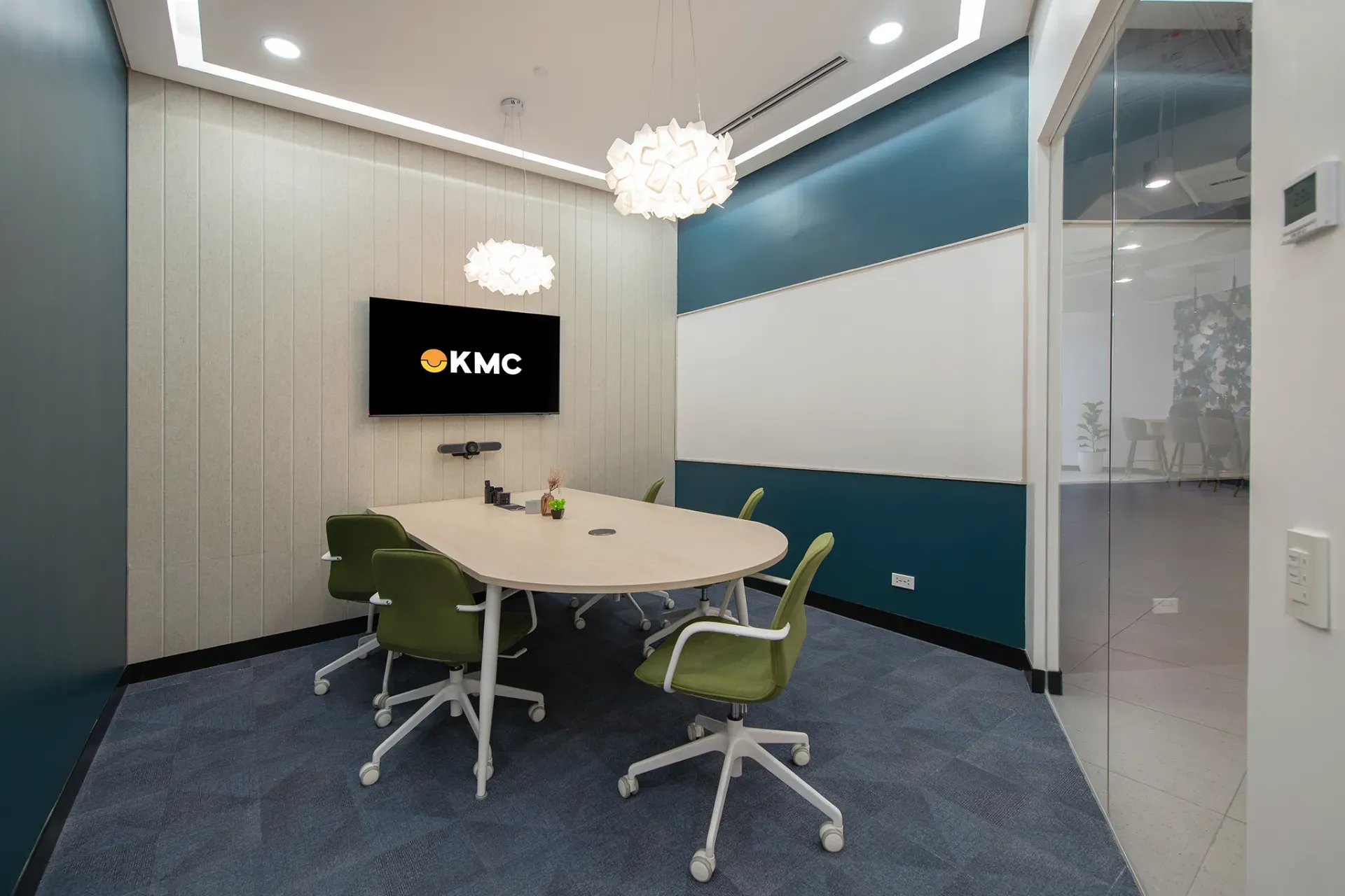 KMC Solutions — One Ayala Mall workspace hero